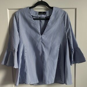 White and royal blue blouse.